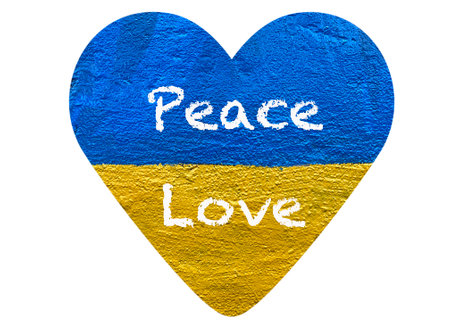 message Peace Love on heart with Ukrainian flag painted on wallの写真素材