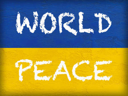 Stand with Ukraine: message World Peace on Ukrainian flag painted on stone wallの写真素材