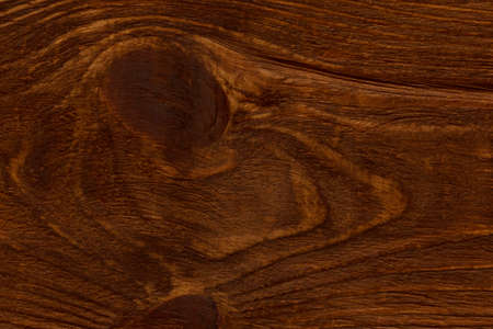 close up of dark brown wooden board textureの写真素材