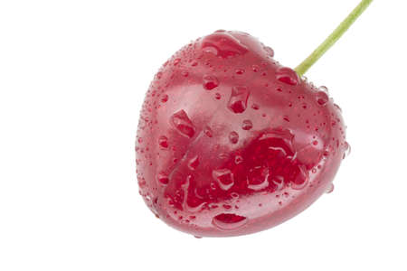 close up of wet ripe red cherry isolated on whiteの写真素材