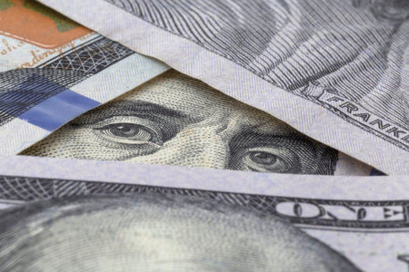 close up of eyes of Franklin on one hundred dollars banknote