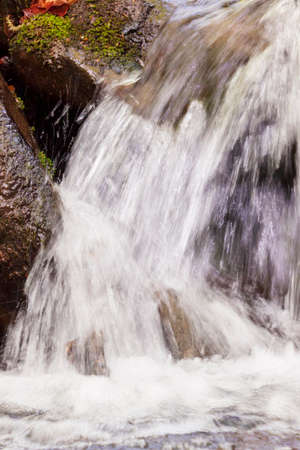 view on waterfall on a brook in Carpathian mountainsの写真素材