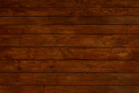 dark brown wood background made of horizontal planksの写真素材