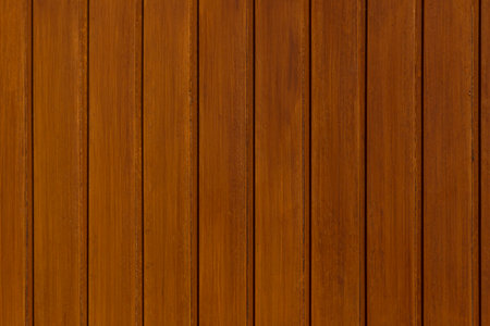 brown wooden wall made of vertical planksの写真素材
