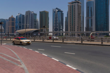 sight of district in Dubai with taxi on a roadの写真素材