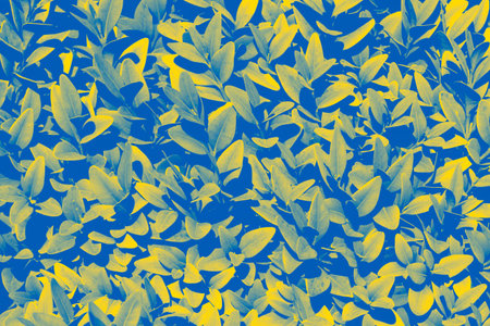 close up of hedge colored in colors of Ukrainian flag