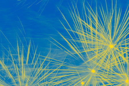 abstract holiday background: fireworks in night sky colored in colors of Ukrainian flagの写真素材