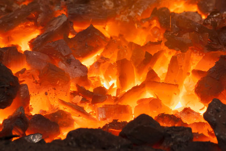 close up of hot coals in forge