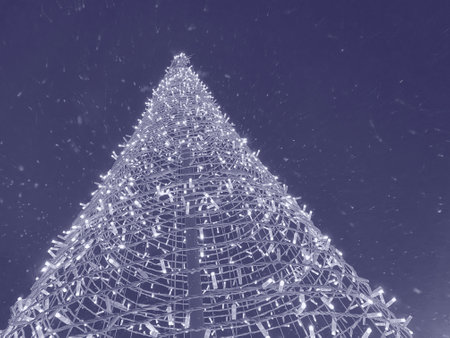 view on Christmas tree at snow against blue night skyの写真素材