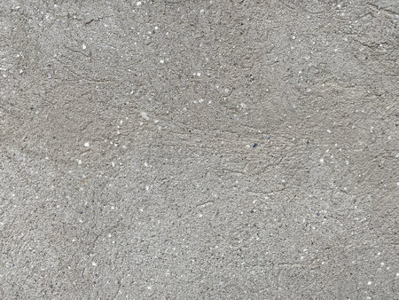 abstract construction background: close up of plaster wall textureの写真素材