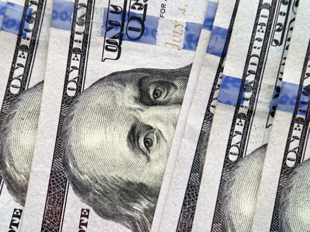 close up of several one hundred United States dollars banknotesの写真素材