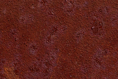 close up of abstract dark red rusty metal surfaceの写真素材