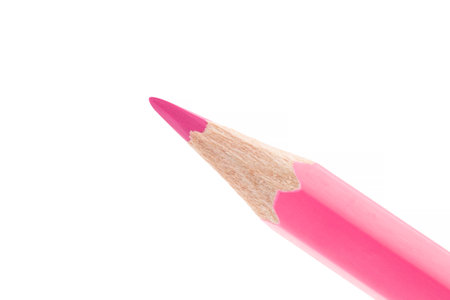 close up of tip of pink wooden pencil isolated on white backgroundの写真素材