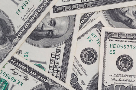 close up of several one hundred US dollars banknotesの写真素材