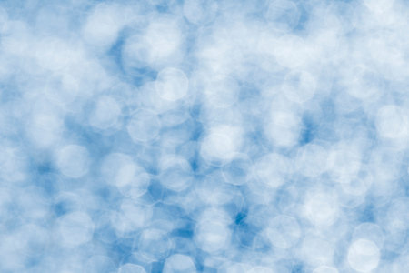 abstract winter backdrop: close up of blue bokeh backgroundの写真素材