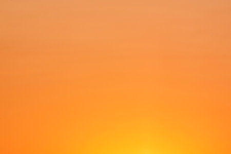 abstract natural background: view on bright clear sky at sunriseの写真素材