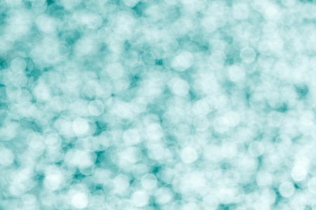 abstract turquoise background: close up of bokeh circlesの写真素材