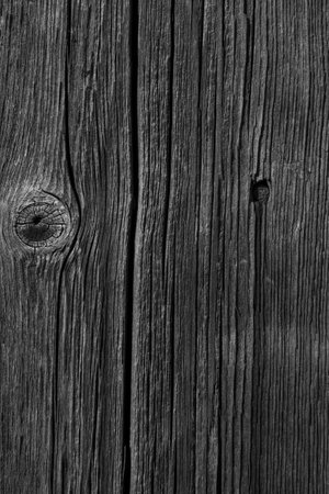 black and white photo of old wooden board textureの写真素材