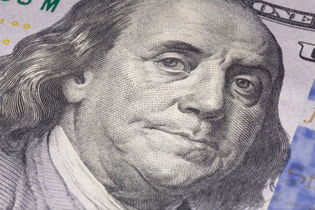 portrait of Benjamin Franklin on one hundred US dollars note
