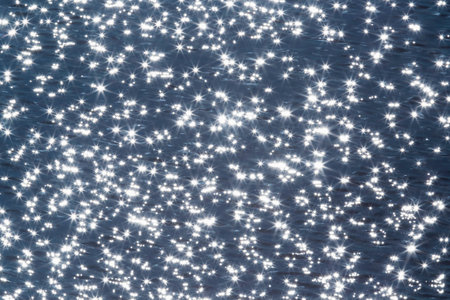 abstract natural background: view on sunshine in a blue waterの写真素材