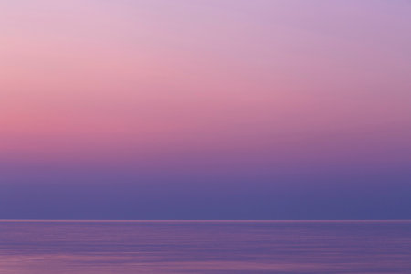 picturesque sight of sea and sky at sunriseの写真素材