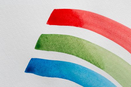 RGB color concept: red, green and blue watercolor strokes on white paperの写真素材