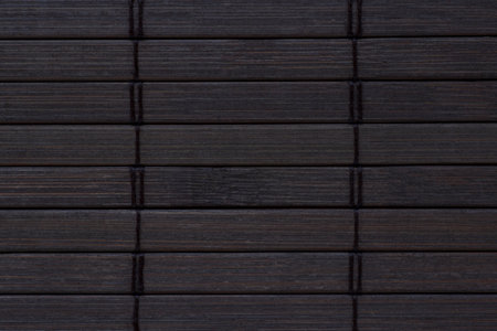 close up of dark brown bamboo napkin backgroundの写真素材