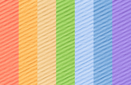 abstract color background: close up of seven stripes of paper colored as rainbowの写真素材