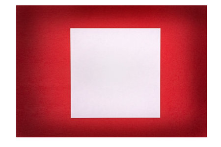 pink square paper note on red cardboard wall isolated on white backgroundの写真素材