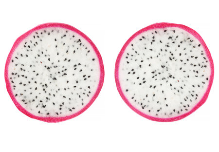 two round cuts of dragon fruit isolated on whte backgroundの写真素材