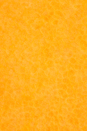 abstract natural background: close up of orange color pumpkin pulp textureの写真素材