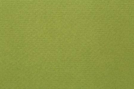 abstract background: close up of green cardboard textureの写真素材