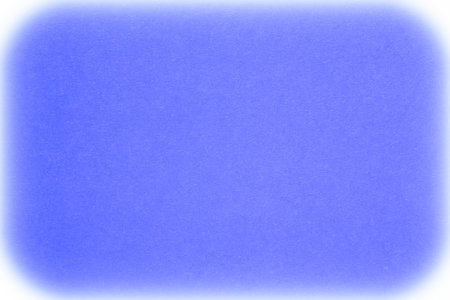 abstract Christmas backdrop: blue cardboard with white borderの写真素材