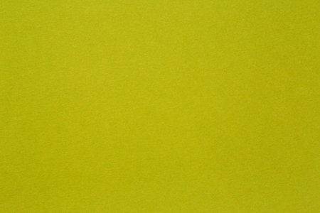 abstract background: close up of lime green color cardboard textureの写真素材