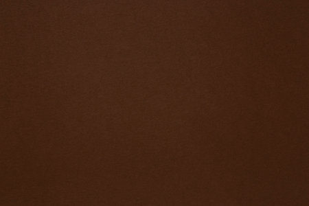 abstract background: close up of coffee color cardboard textureの写真素材