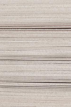 abstract background: close up of  stack of pages of top edge of thick bookの写真素材