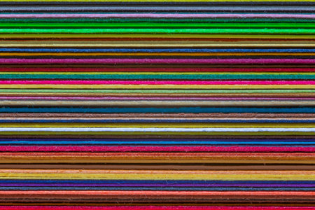 abstract backdrop: close up of stack of color paper for design and artの写真素材