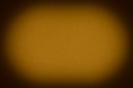 abstract background: close up of blank dark brown flat sponge panel with shadowed borderの写真素材