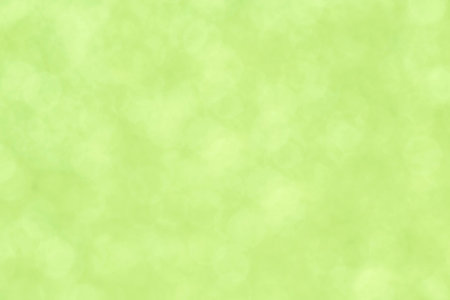abstract backdrop: close up of light green bokeh backgroundの写真素材