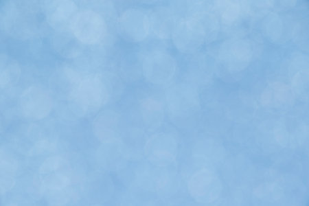 abstract winter season backdrop: close up of light blue bokeh textureの写真素材