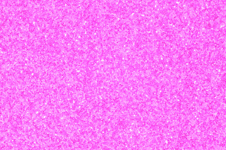 abstract pink color glamour backdrop: close up of shiny glitter textureの写真素材