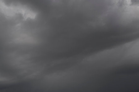 abstract natural background: view on dark thunderstorm cloudsの写真素材