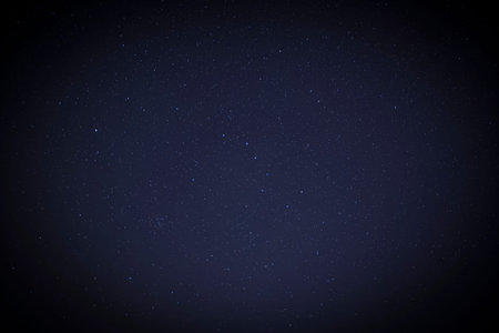 abstract natural background with shadowed edges: dark blue night sky with Ursa Major constellation