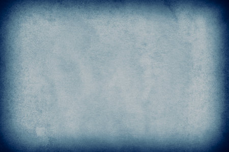 abstract grunge backdrop with shadowed edges: close up of canvas stained in blueの写真素材
