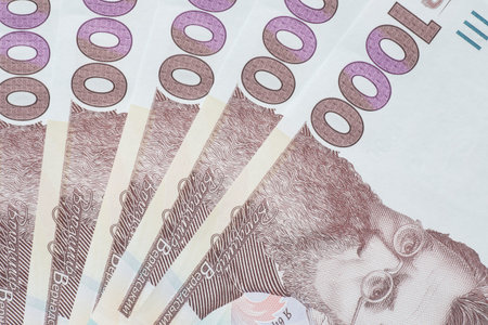 close up of several fanshaped one thousand Ukrainian hrivnya banknotes