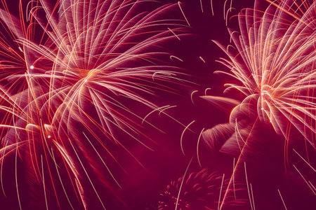 holiday card backdrop: several firework bursts against dark purple night sky