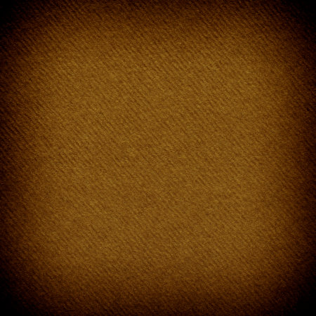 abstract square card design backdrop: close up of coffee color textured craft paper with shadowed edgesの写真素材