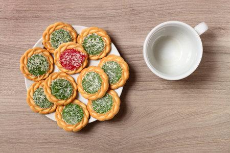Biscuits on a plate and empty coffee cup. The view from the top.の写真素材
