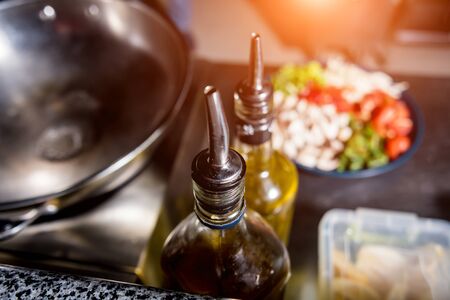 Chef cooking pasta with vegetables in pan. Italian style cuisine. Restaurant.の写真素材