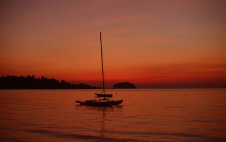 Beautiful sunset at the beach in the tropics. Sky and ocean. Backgroundの写真素材